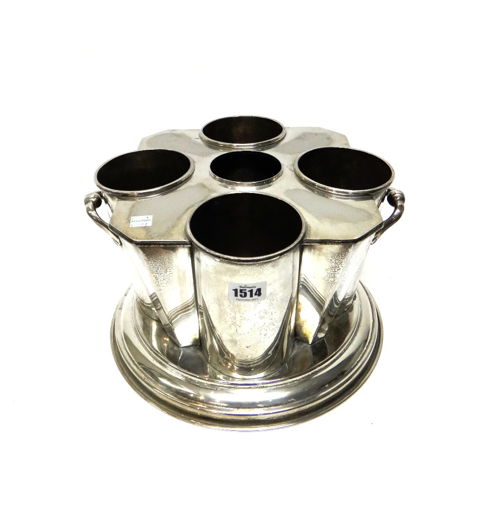 Appraisal: A plated twin handled shaped circular wine cooling stand with