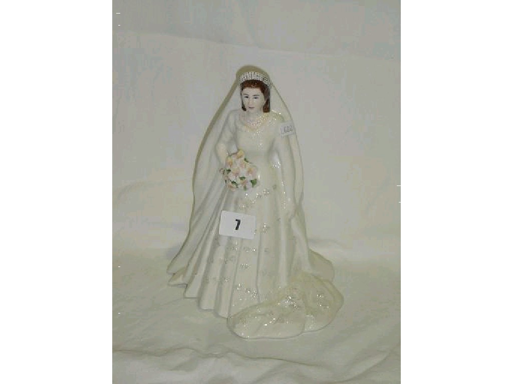 Appraisal: A Royal Worcester figure of Queen Elizabeth II commemorating the