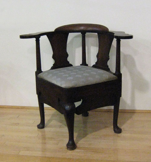 Appraisal: Queen Anne mahogany corner chair ca with shaped arms and