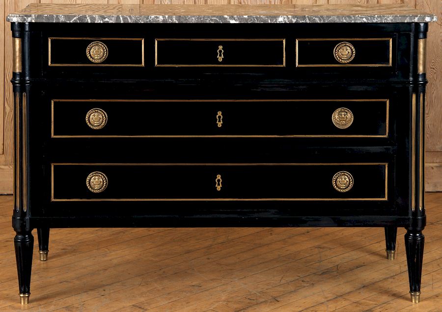 Appraisal: FRENCH EBONIZED LOUIS XVI STYLE COMMODE A French ebonized Louis