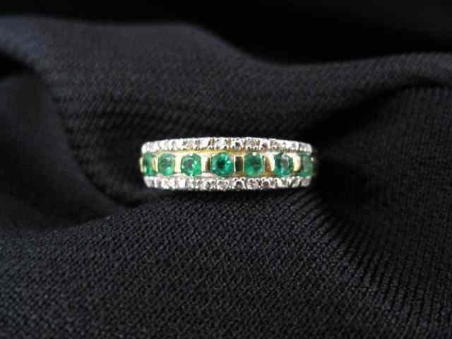 Appraisal: Emerald Diamond Ring fine round emeralds with diamonds on each