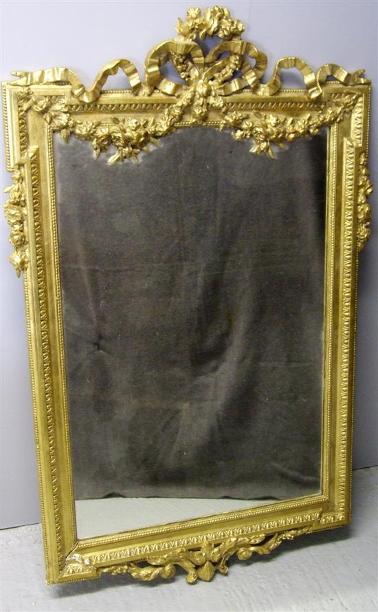 Appraisal: th century carved giltwood wall mirror decorated with ribbons foliage