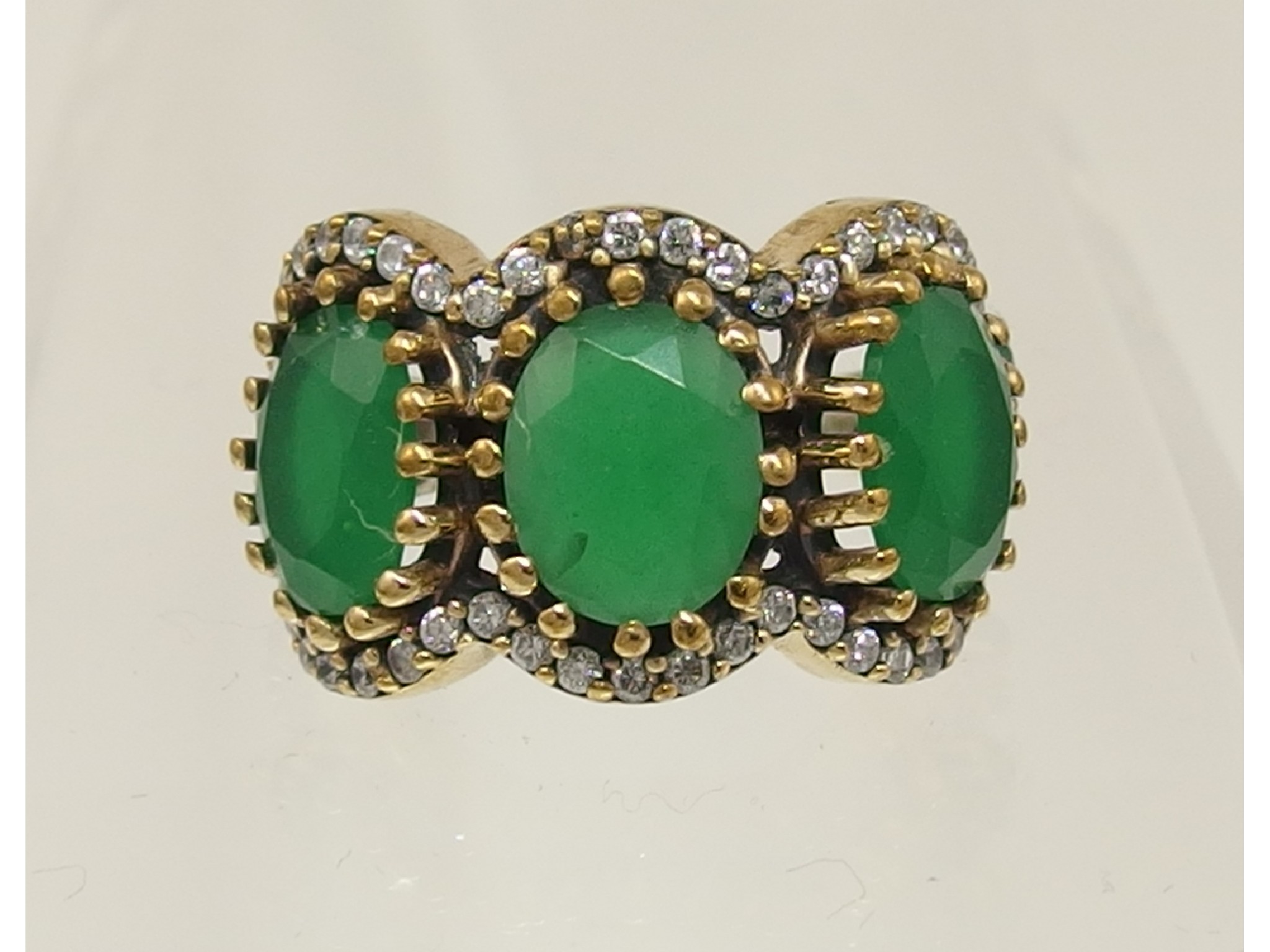 Appraisal: An emerald white metal ring