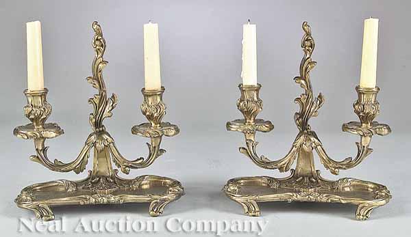 Appraisal: A Pair of Rococo-Style Bronze Two-Light Candelabra th c acanthus