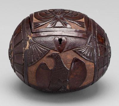 Appraisal: Carved coconut jewelry cask coconut with hinged lid two panels