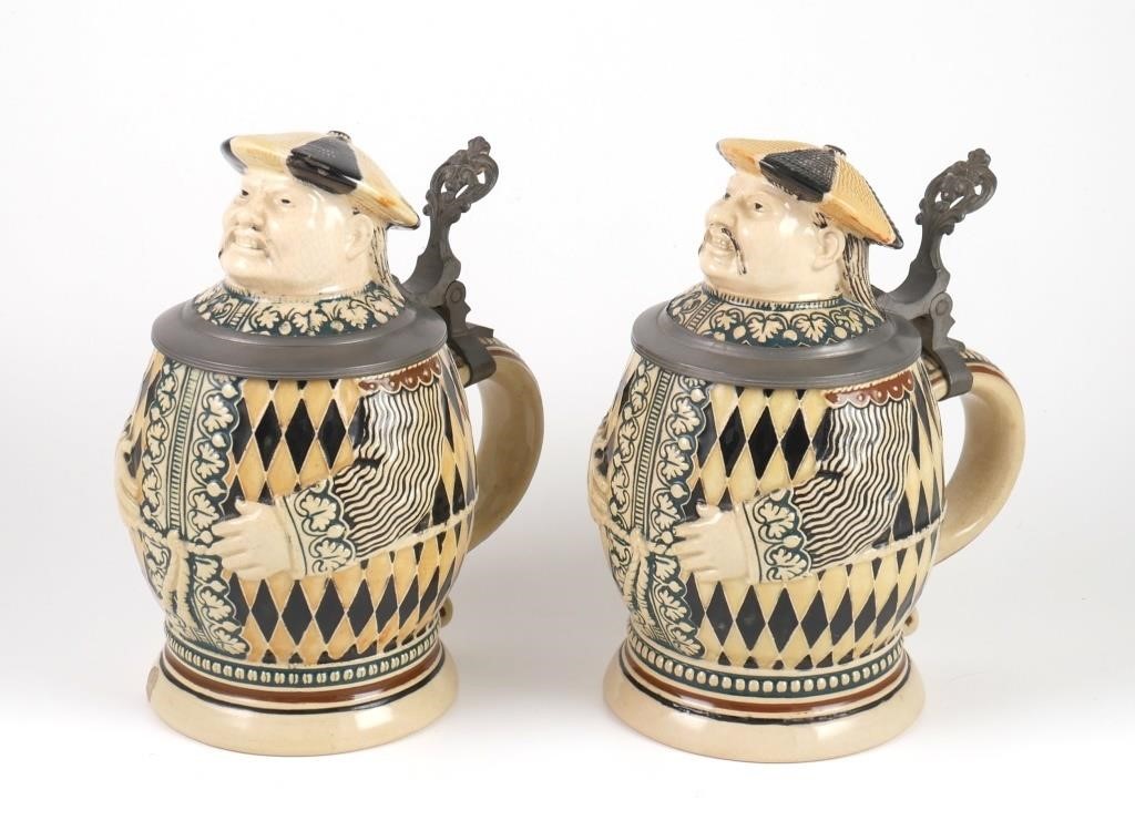 Appraisal: Two Chinaman pattern character steins by Merkelback Wick One in