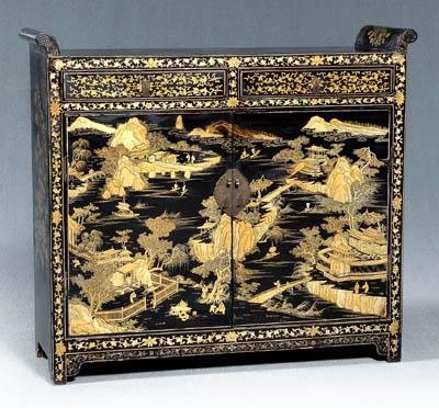 Appraisal: Chinese lacquered cabinet two drawers over two doors flanged top