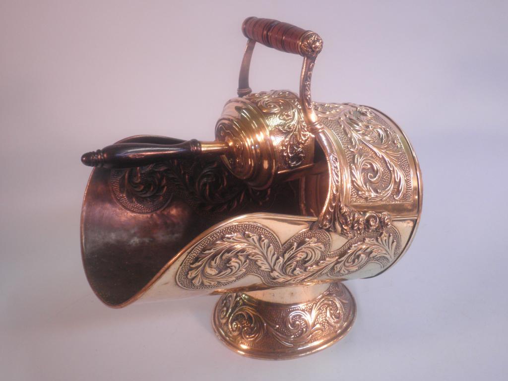 Appraisal: A Benham Froud brass coal scuttle and shovel the scuttle