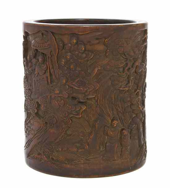 Appraisal: A Hardwood Brush Pot relief carved throughout with figures in