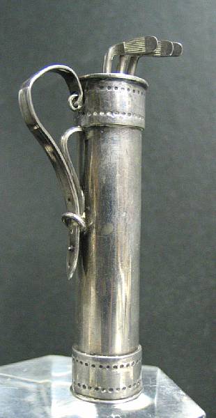 Appraisal: A small silver golf bag measuring in high complete with