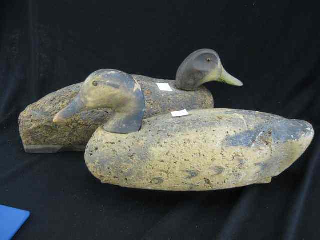 Appraisal: Pair of Old Duck Decoys carved wooden headson cork bodies