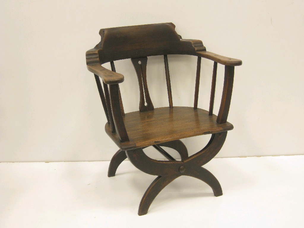 Appraisal: A th Century 'X' frame Windsor type Elbow Chair with