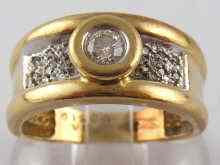 Appraisal: A yellow metal tests carat gold diamond ring the central