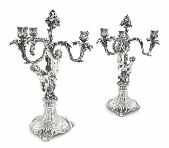 Appraisal: A Pair of Italian Silver Three-Light Candelabra Milano each of