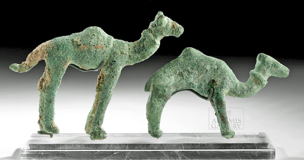 Appraisal: Ancient South Arabian Bronze Camels pr Originally Listed At Ancient