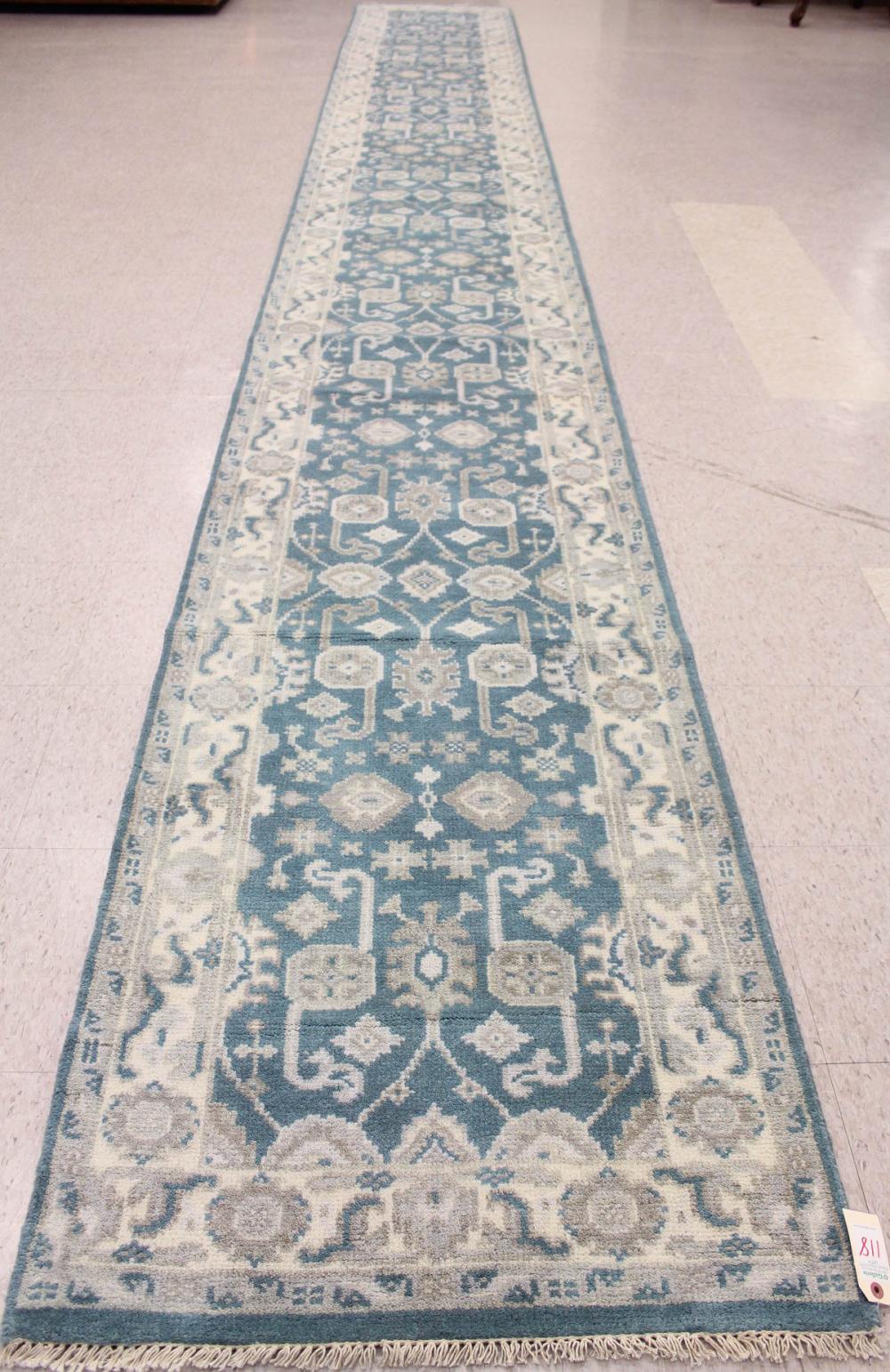 Appraisal: HAND KNOTTED ORIENTAL CORRIDOR RUG Indo-Oushak design on teal blue