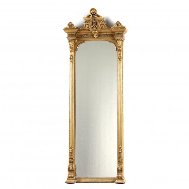 Appraisal: RENAISSANCE REVIVAL CARVED AND GILT PIER MIRROR th century tall