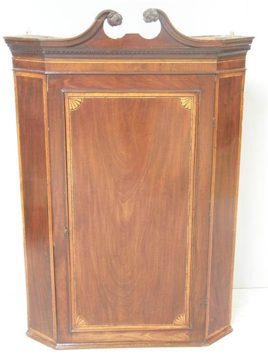 Appraisal: th century mahogany and parquetry inlaid wall hanging corner cabinet