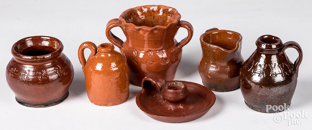 Appraisal: Six pieces of Pennsylvania redware Six pieces of Pennsylvania redware