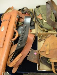 Appraisal: Group lot of military Western holsters belts and leather gun