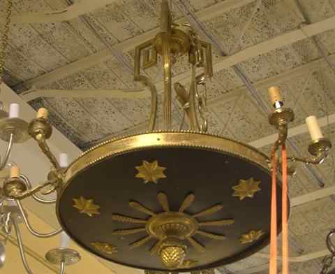 Appraisal: EMPIRE STYLE PARCEL-GILT AND BRONZE CHANDELIER the patinated shallow bowl