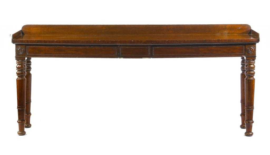 Appraisal: A WILLIAM IV MAHOGANY SERVING TABLE the galleried top with