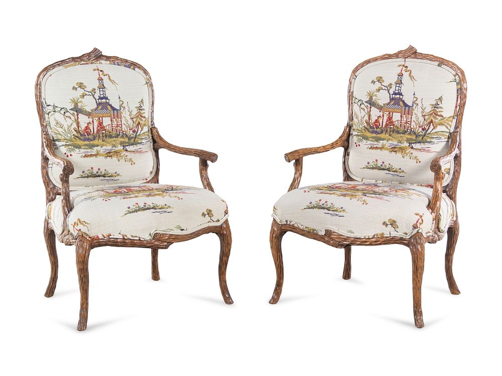 Appraisal: A Pair of Louis XV Style Faux Bois-Carved Fauteuils A