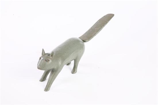 Appraisal: CARVED SQUIRREL American th century hardwood Running squirrel with grey