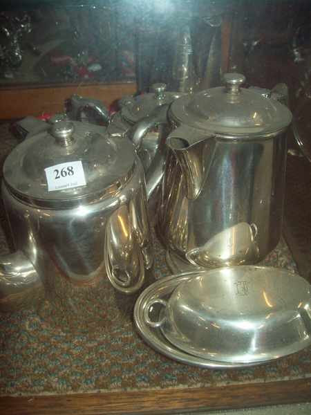 Appraisal: A COLLECTION OF SIX SILVER PLATED TEA POTS AND ONE