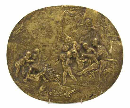 Appraisal: A Continental Bronze Relief Plaque of oval form depicting a