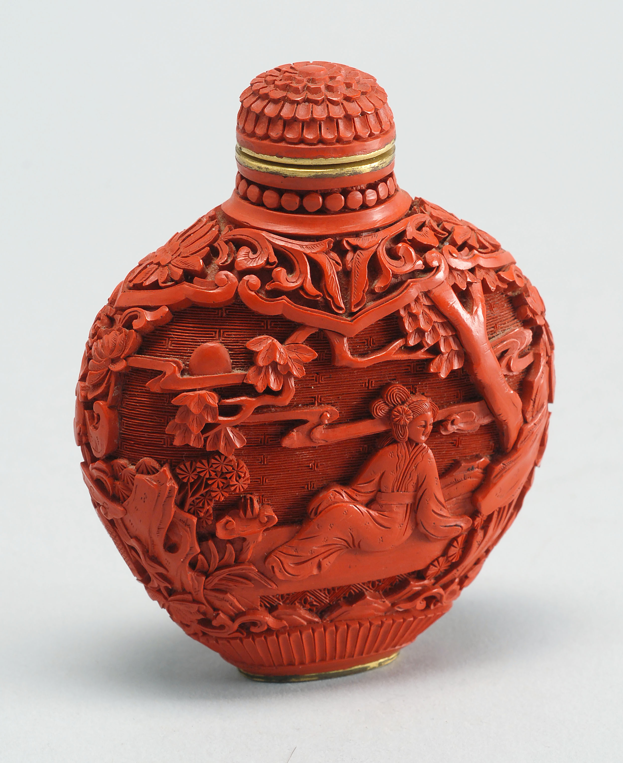 Appraisal: CINNABAR SNUFF BOTTLE th CenturyIn spade shape with figural landscape