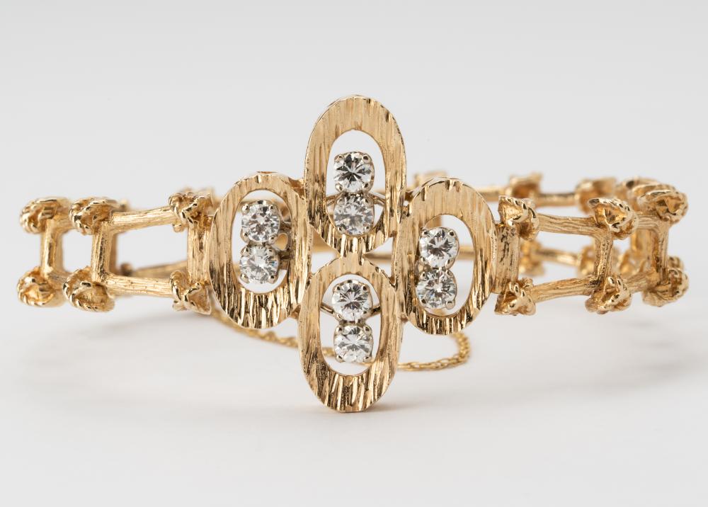 Appraisal: KARAT YELLOW GOLD DIAMOND BRACELETcontaining eight full-cut diamonds G-I VS