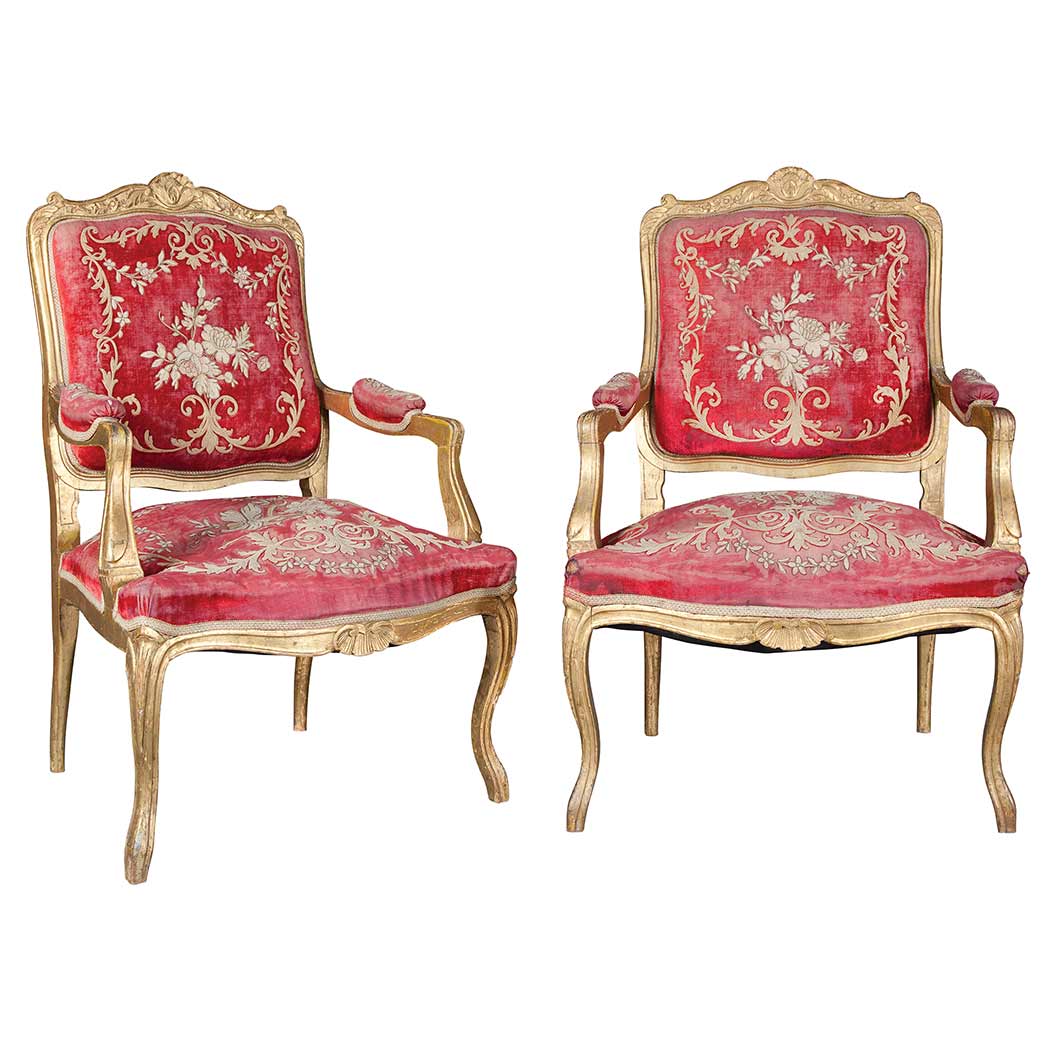 Appraisal: Pair of Louis XV Style Giltwood Fauteuils Each foliate serpentine