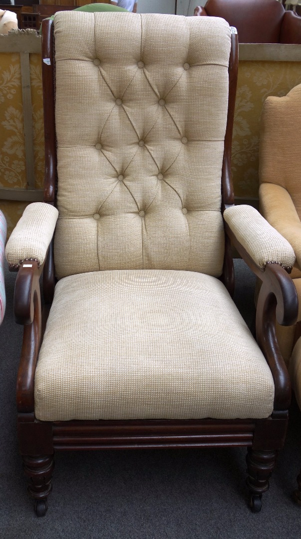 Appraisal: A th century mahogany framed open armchair with angle adjustment