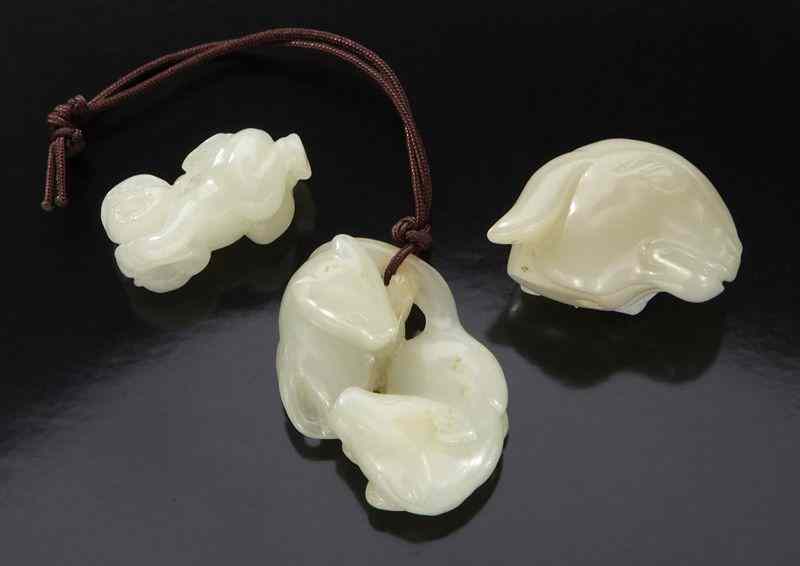 Appraisal: Pcs Chinese Qing carved jade double boy boy sheep's head