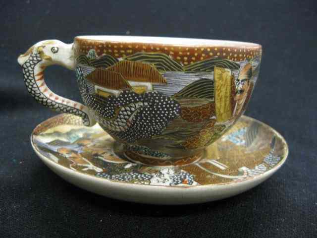 Appraisal: Japanese Satsuma Pottery Cup Saucer men dragon decor figural dragon