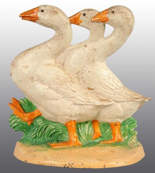 Appraisal: Cast Iron Three Geese Doorstop Description Made by Hubley cat