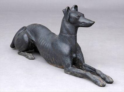 Appraisal: CAST IRON BLACK PAINTED FIGURE OF A WHIPPET x x