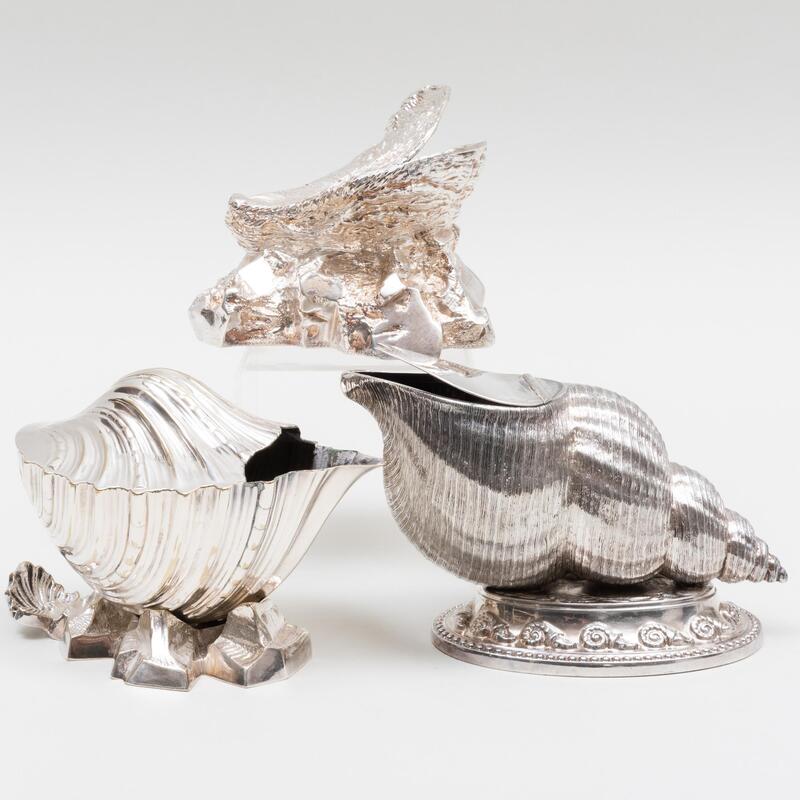 Appraisal: Group of Three Silver Plate Shell Form Spoon Warmers Comprising