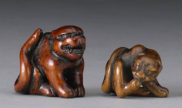 Appraisal: Two wood studies of tigers th Century Each of the