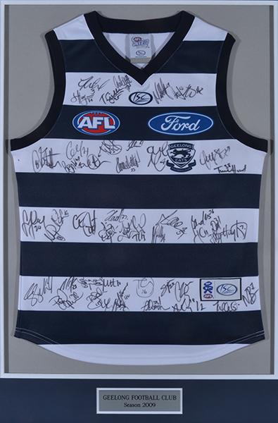 Appraisal: GEELONG CATS AFL JERSEY SIGNED BY TEAM FRAMED