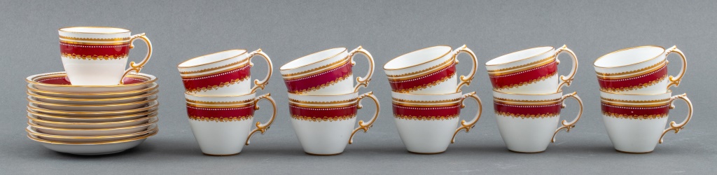 Appraisal: ROYAL CROWN DERBY RED AND GOLD DEMITASSE SET Edwardian Royal