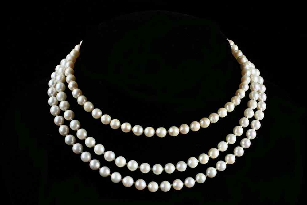 Appraisal: NECKLACES - Double strand of mm pearls with K gold