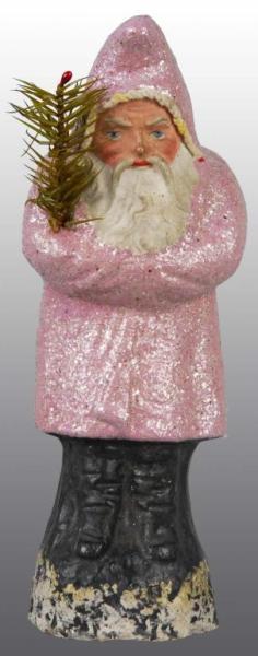 Appraisal: Pink Santa Belsnickle Holding Tree Description No damage Provenance Joyce