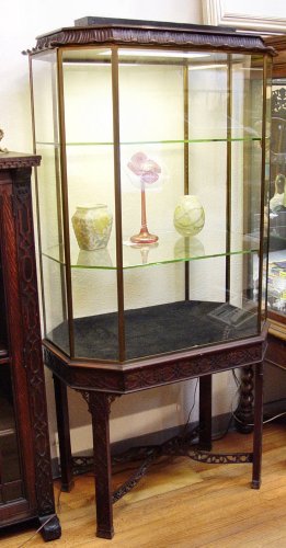 Appraisal: CHINESE CHIPPENDALE MAHOGANY AND GLASS DISPLAY CABINET Octagonal glass case