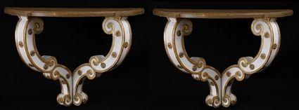 Appraisal: PAIR OF BAROQUE-STYLE CARVED PAINTED AND PARCEL-GILT SMALL CONSOLES Each