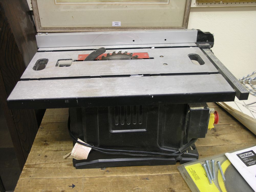 Appraisal: A McKeller in tablesaw with user handbook and various blades