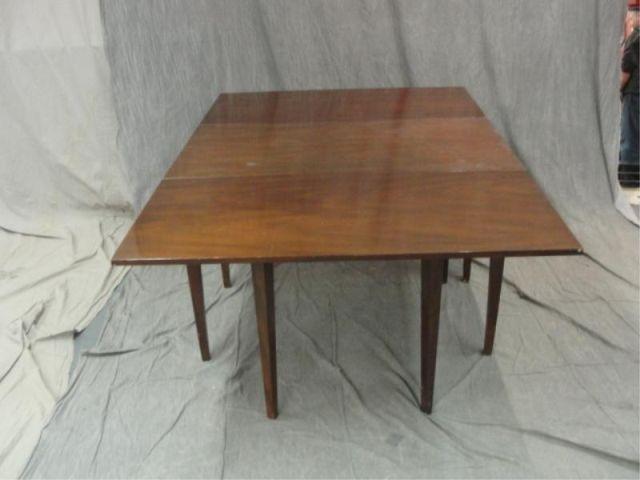 Appraisal: KITTINGER Mahogany Drop Leaf Table With burn mark on drawer