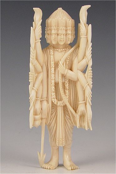 Appraisal: CARVED IVORY DIETY Ten faces and ten arms '' tall