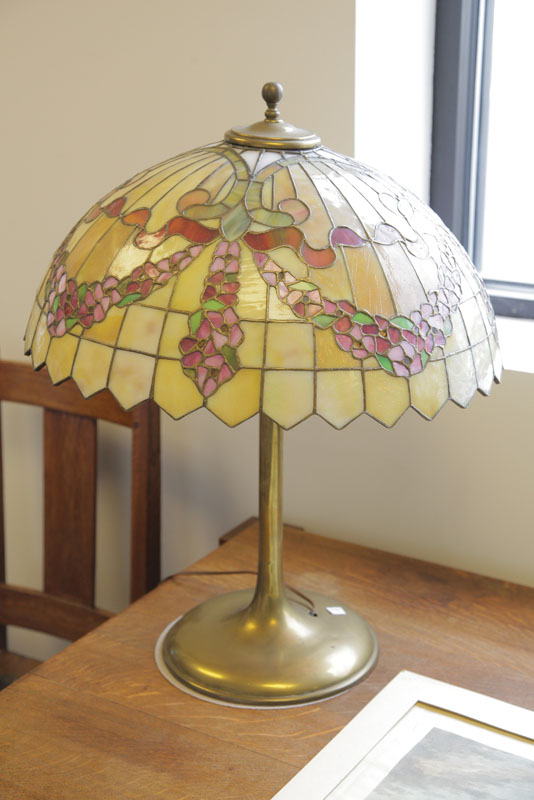 Appraisal: LEADED GLASS TABLE LAMP Possibly Unique Brass base and carmel